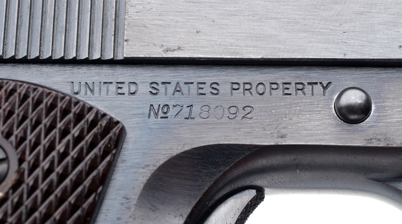 Close-up of serial number and right side frame markings.